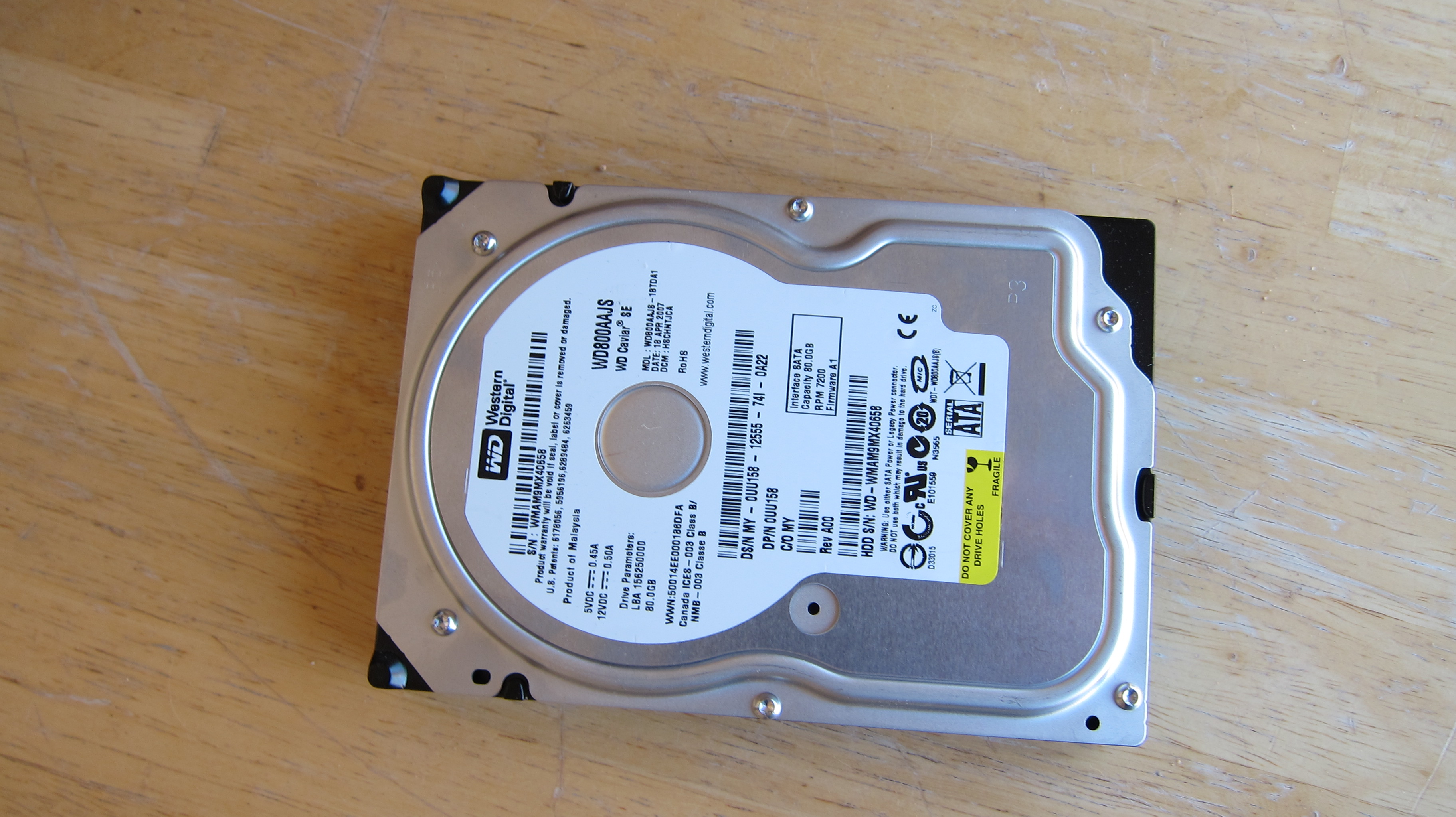 How to remove the hard drive from a tower computer?